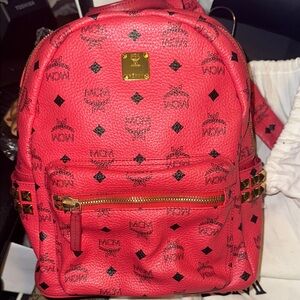 MCM Pink with gold tone studs and hardware Logo Backpack